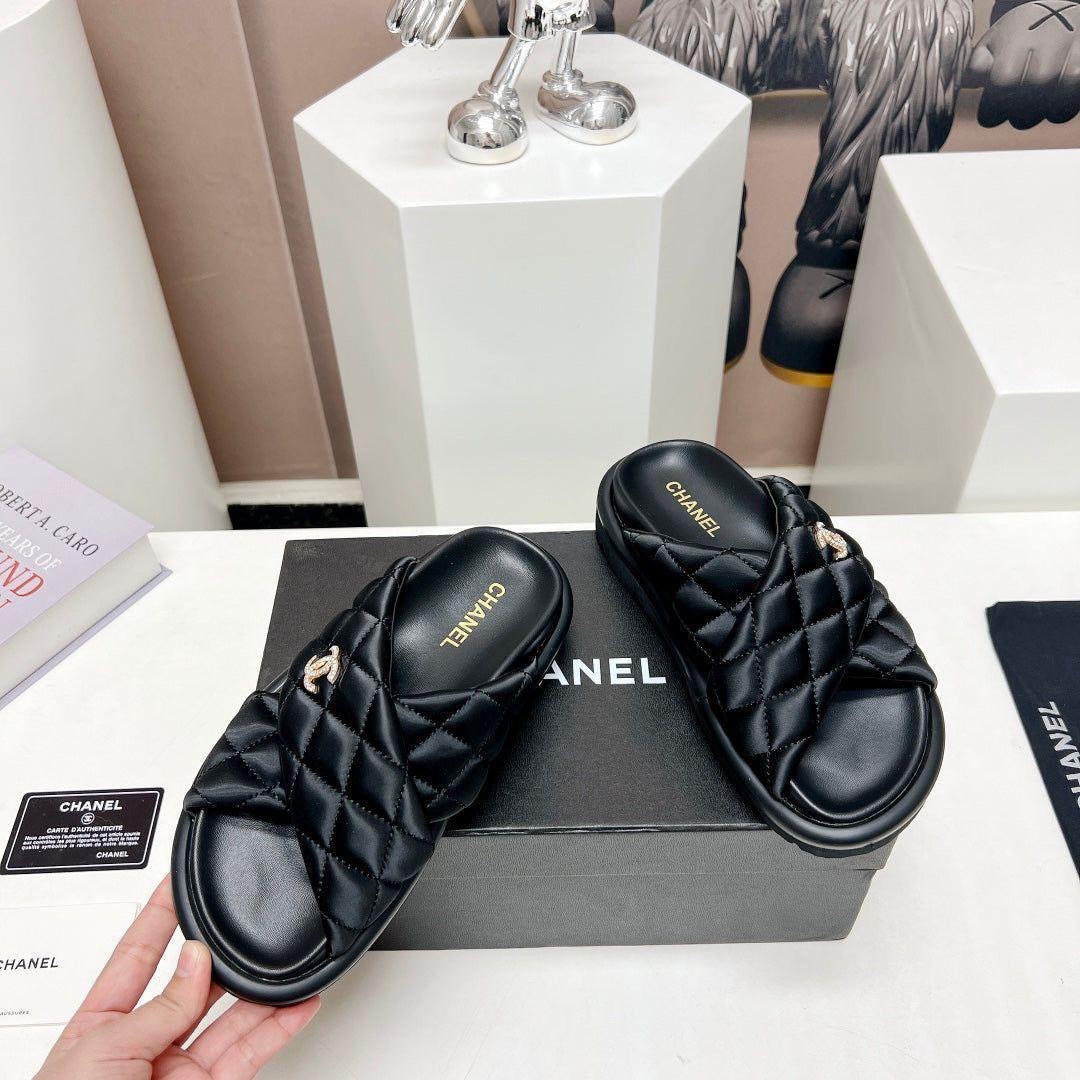 Chanel Quilted Cross Slides