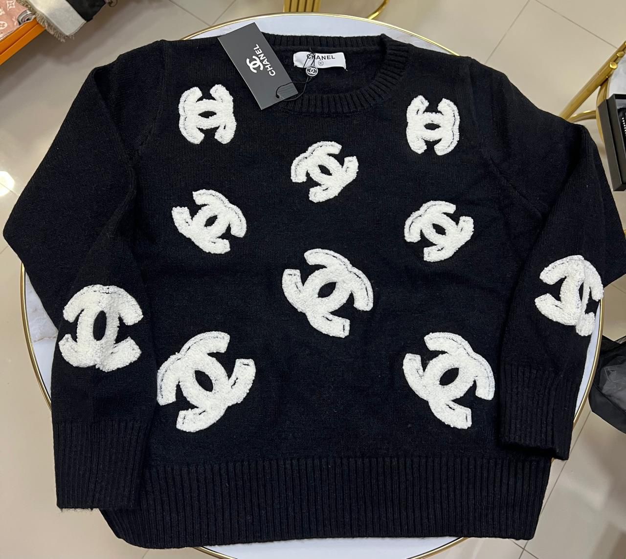 Chanel Sweater Logo