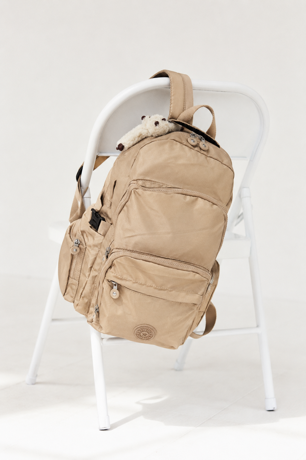 Kipling Beige Multi-Pocket Backpack